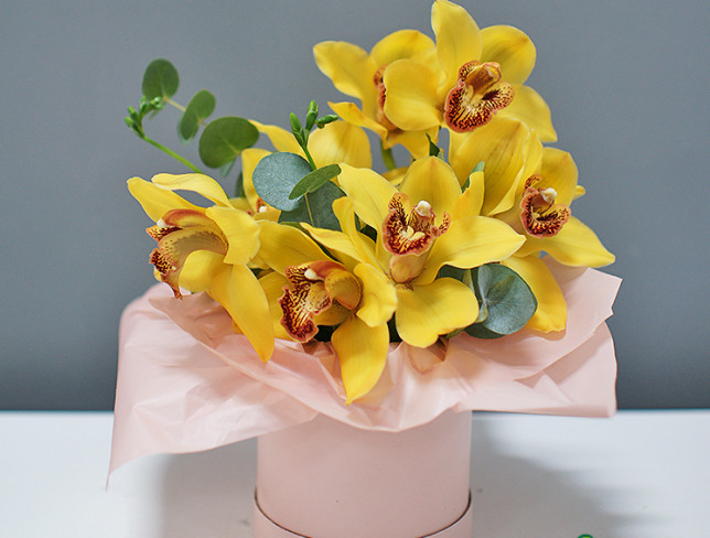 Box with yellow orchids photo